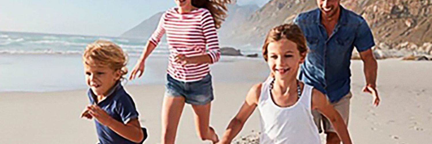 Kids running on the beach_web-featured